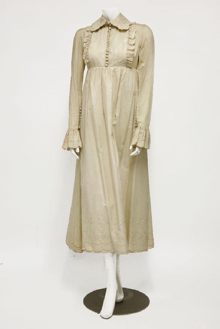 A John Bates for Jean Varon 1960s brown chiffon: A John Bates for Jean Varon 1960s brown chiffon full-length dress,with ruffled neckline, andanother 1960s white cotton full-length dress,with embroidered detailing to sleeves and hemline, also reputed