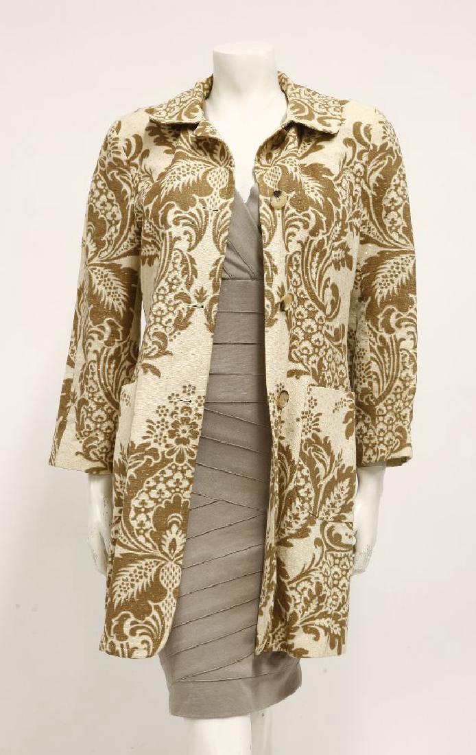 A Robert Rodriguez taupe bandage style dress: A Robert Rodriguez taupe bandage style dress,US size 4,a Diane von Furstenberg blue and white pattern long sleeve tunic/dress,size US size 8, anda DKNY cream ladies' day coat with printed brown floral