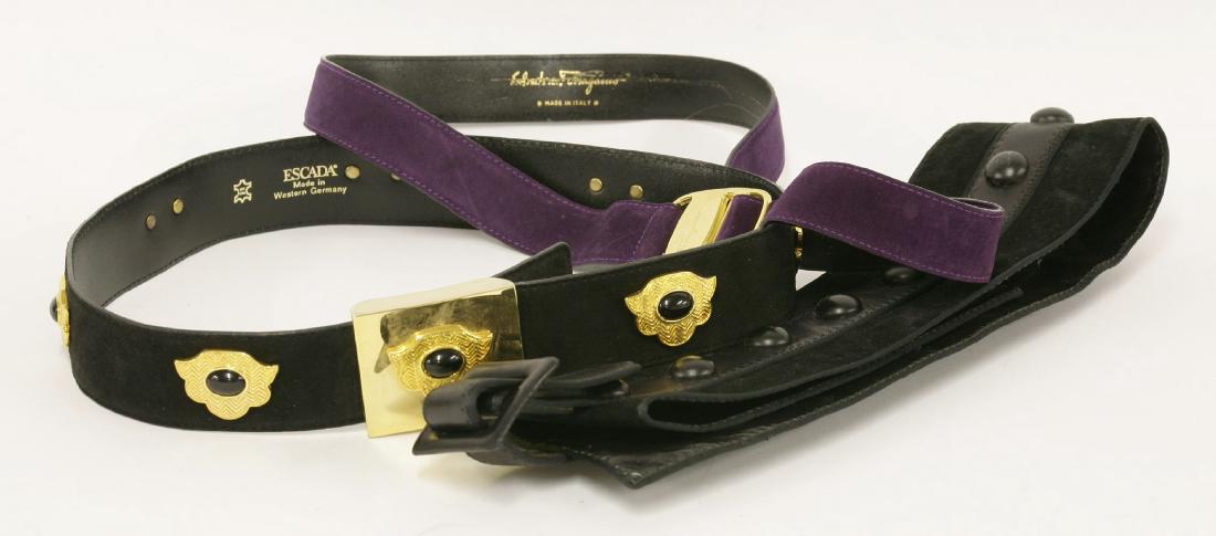 An Escada black suede leather belt: An Escada black suede leather belt,with gilt metal buckle and floral applied designs,a Lanvin black leather and suede waist belt, anda Salvatore Ferragamo purple suede belt,with gilt-tone hardware (3)