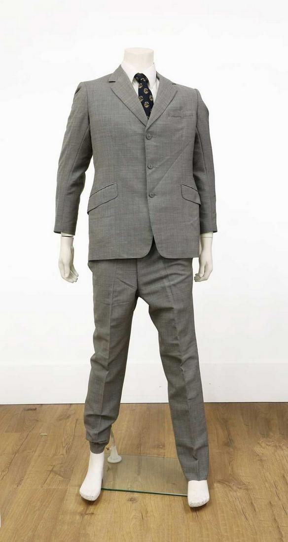 A cream double-breasted jacket, (1 of 12)