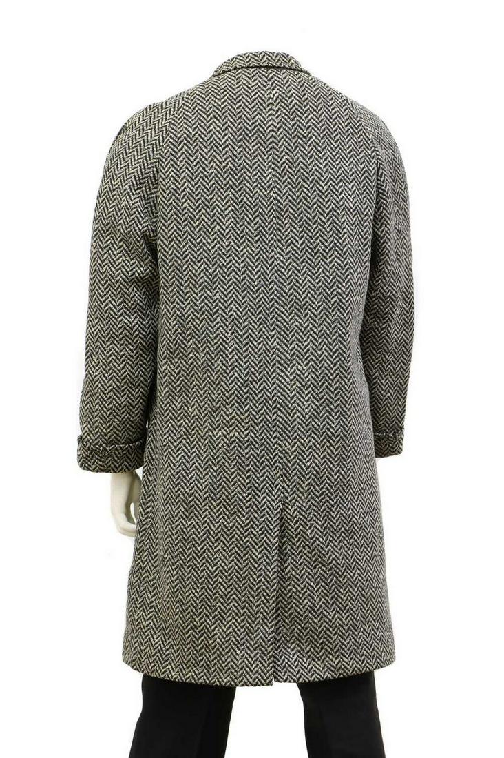 A black and white long single-breasted coat, (1 of 2)
