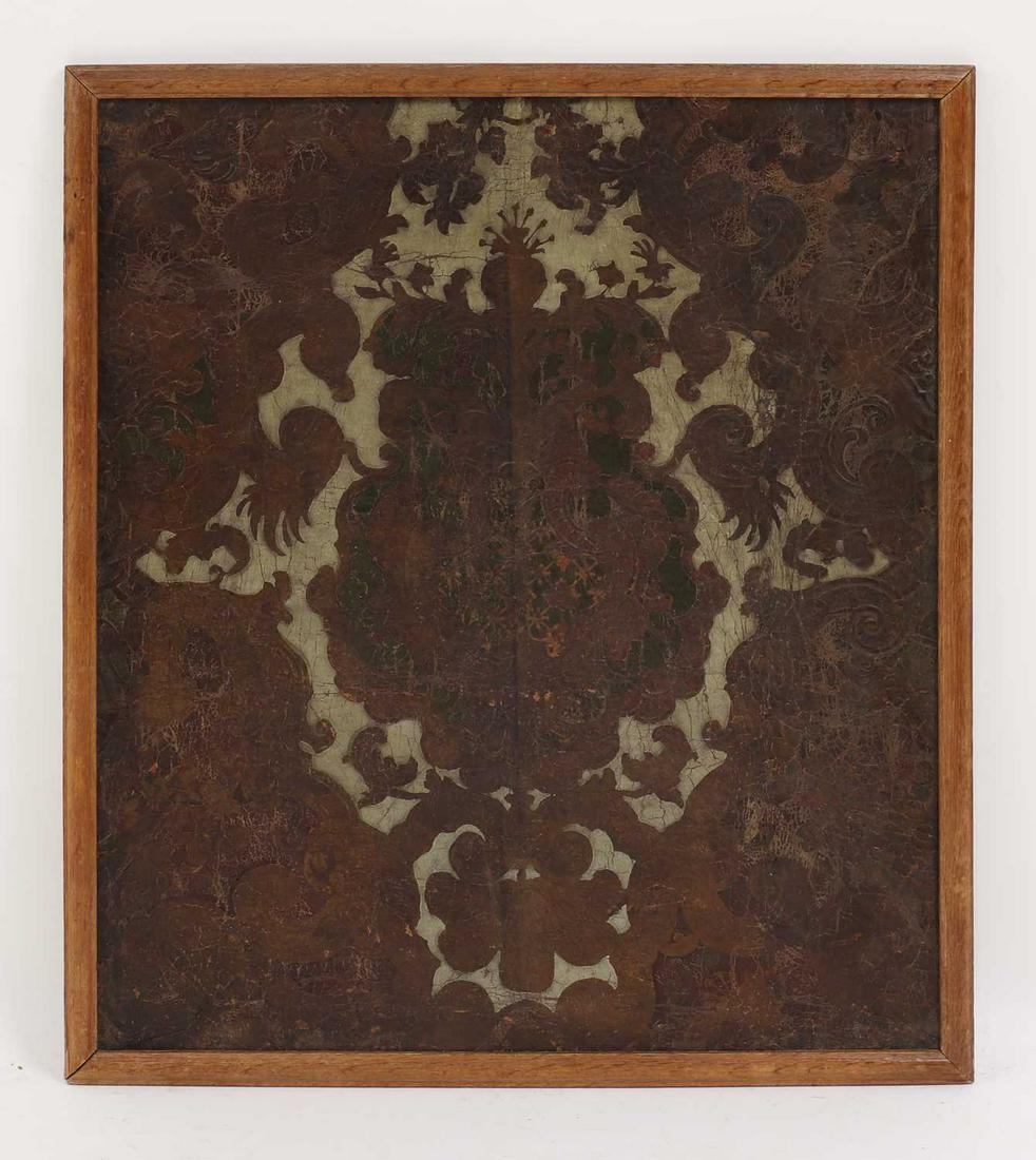 An embossed and painted leather wallpaper panel, (1 of 3)