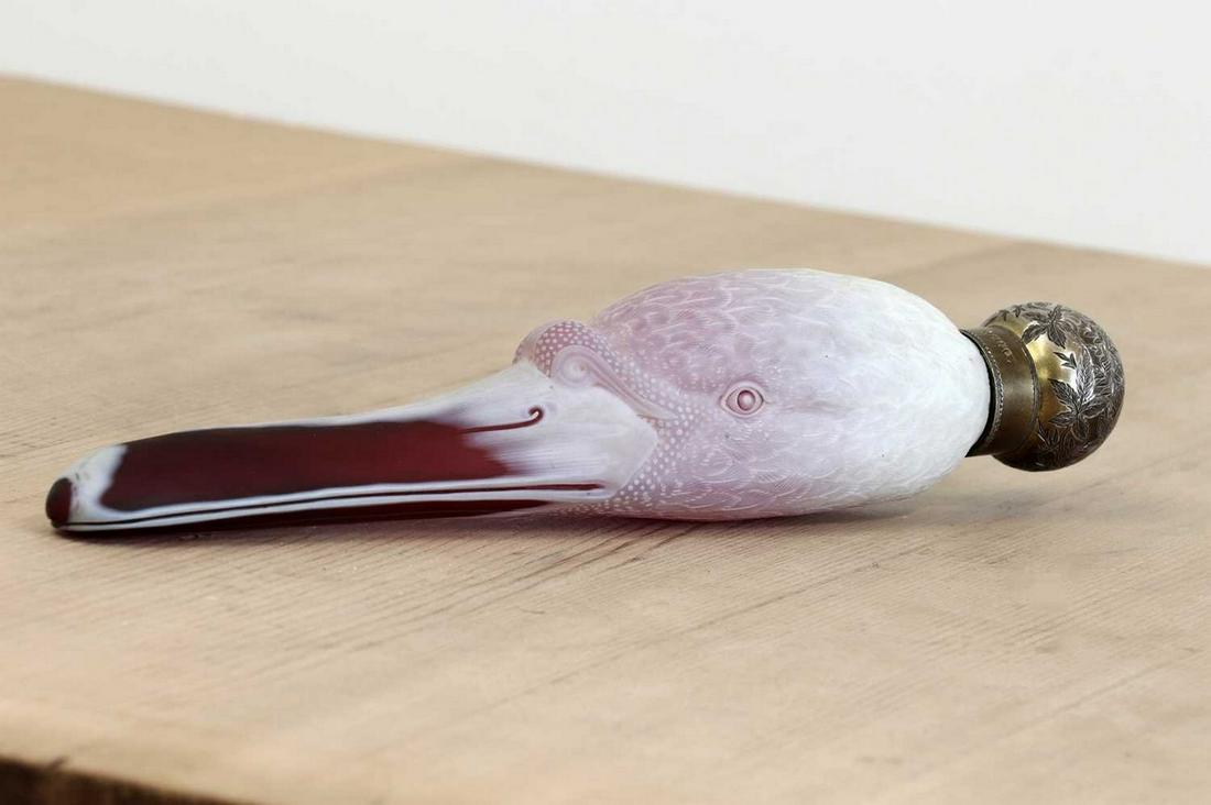 A Thomas Webb & Sons cameo glass swan's head scent bottle,: A Thomas Webb & Sons cameo glass swan's head scent bottle, A Thomas Webb & Sons cameo glass swan's head scent bottle, 1884, of large size, the elegant swan's head cast in deep ruby glass, overlaid in