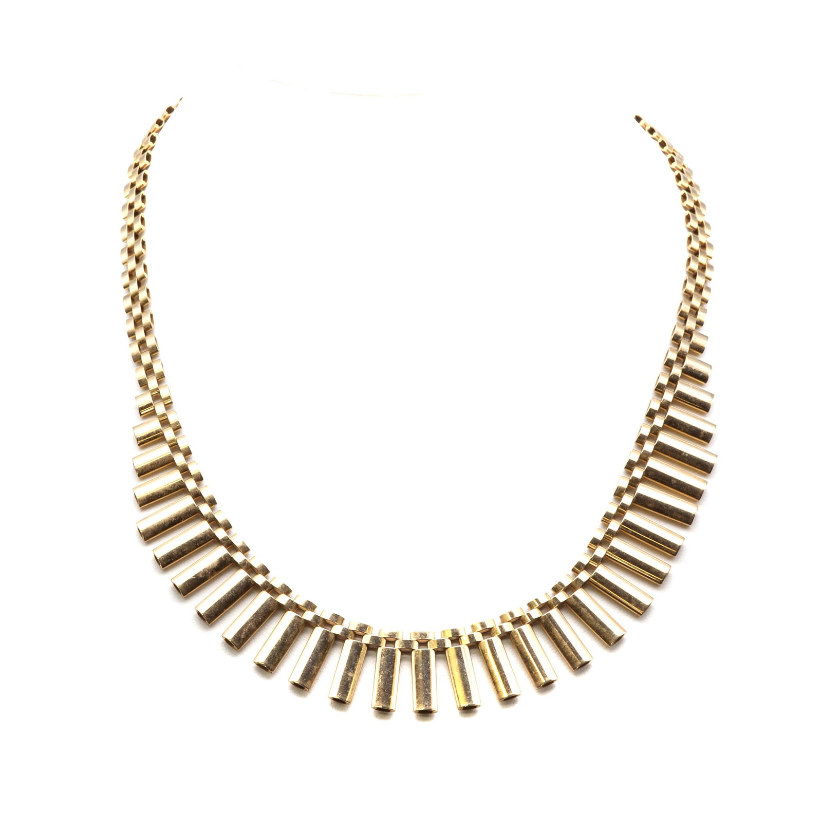 A 9ct gold 'Cleopatra' style fringe necklace,: A 9ct gold 'Cleopatra' style fringe necklace, A 9ct gold 'Cleopatra' style fringe necklace, with a centrepiece of slightly graduated elliptical bars, two a two row panther back chain with concealed bo