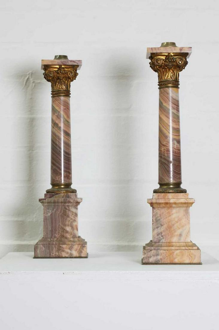 A pair of veined pink marble lamp bases, (1 of 4)