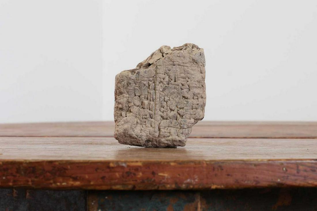 A Sumerian stone tablet fragment, (1 of 2)