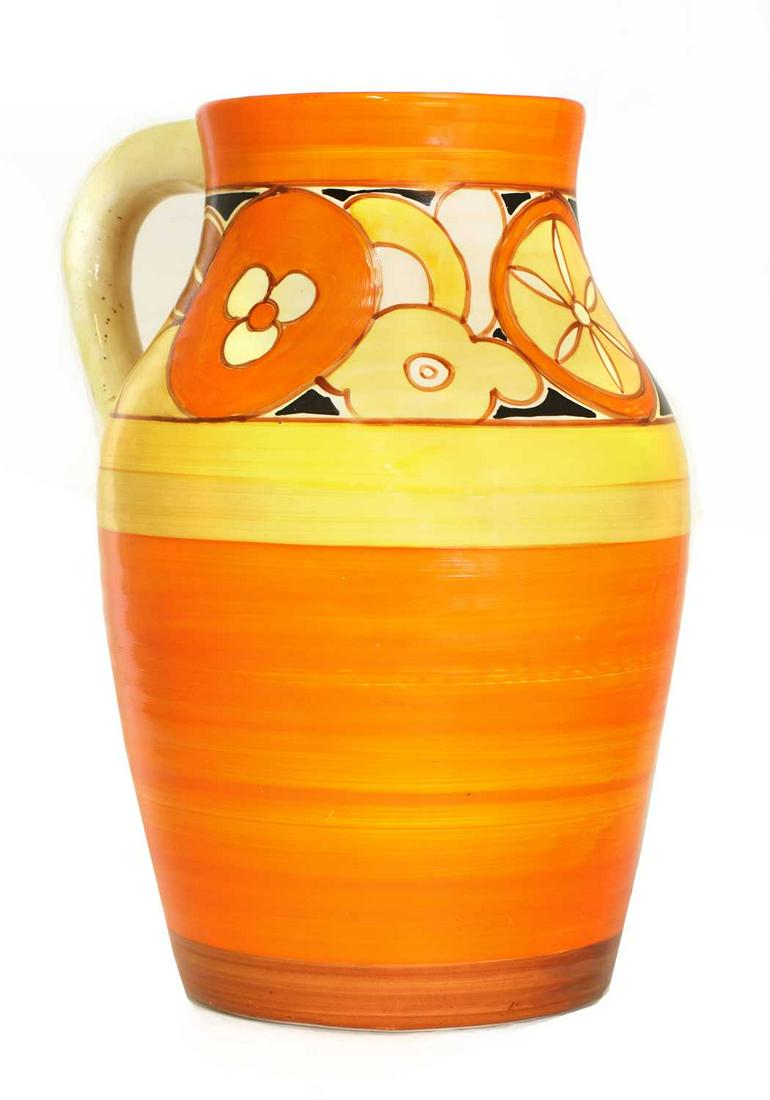 A Clarice Cliff 'Sliced Fruit' Lotus jug, (1 of 3)