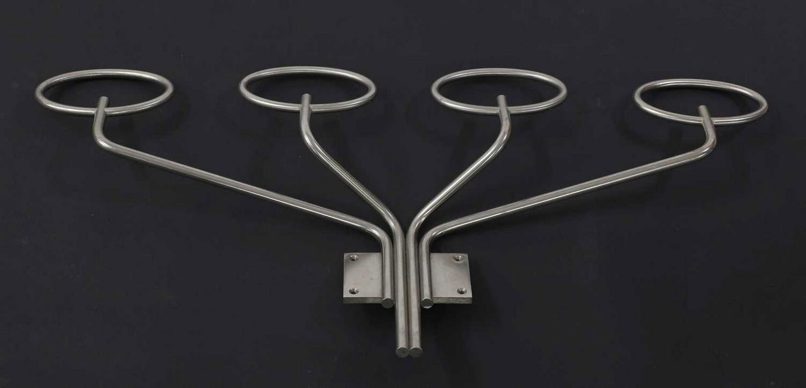 An Italian 'Clitoquattro' coat and hat stand,: An Italian 'Clitoquattro' coat and hat stand, 1960s, designed by Sergio Mazza for Artemide, of four-pronged design, each prong terminating with a hoop, 75cm wide 10cm deep 30cm high