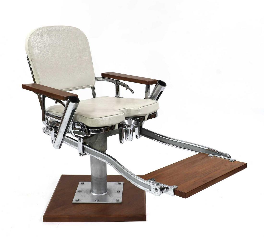 An American 'Rockaway Marlin' fighting chair,: An American 'Rockaway Marlin' fighting chair, with a chromed bronze on steel base and supports, teak seat, armrests, and footrest, with the seat and back cushion upholstered in white leather, 70cm wid