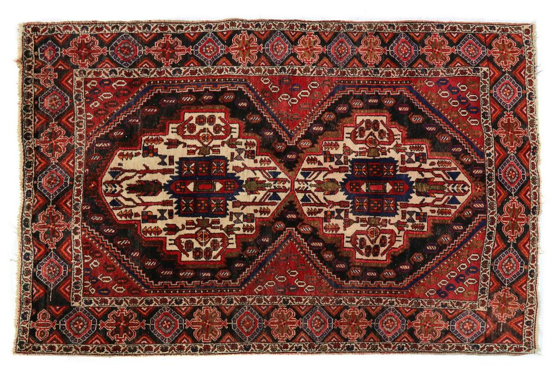 A hand knotted Persian rug, (1 of 4)