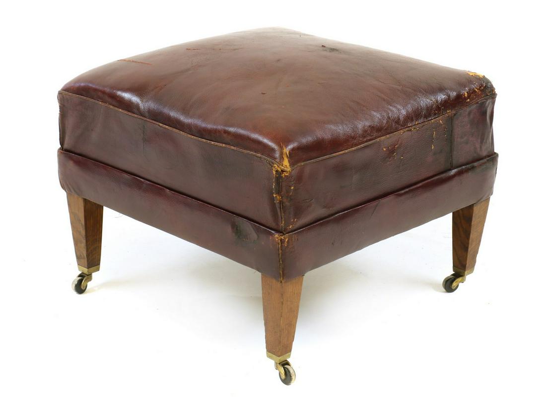 A red leather upholstered footstool in the manner of Howard and Sons (1 of 3)