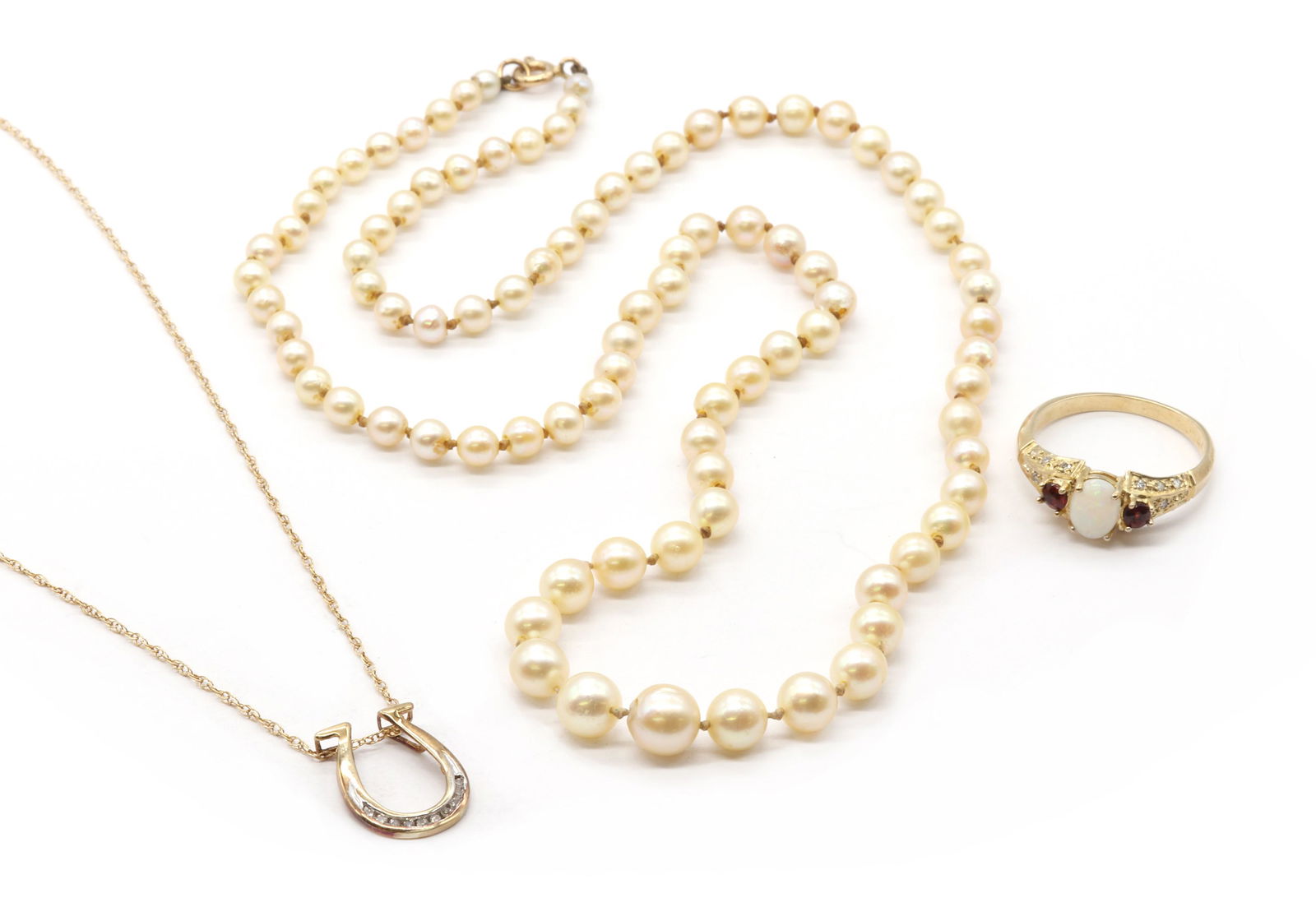 A gold opal, garnet and diamond ring, (1 of 1)