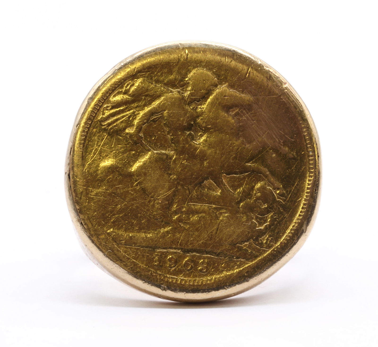 A gold sovereign ring, (1 of 3)