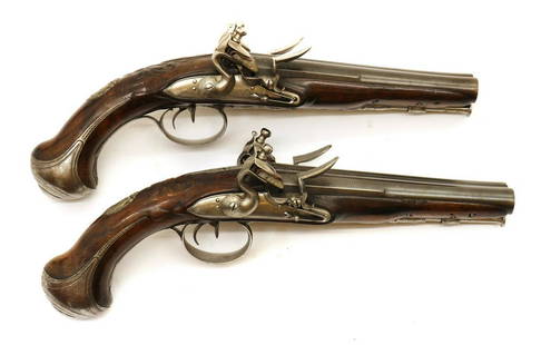 A pair of French 28 bore double barrelled flintlock pistols by Karches a Colmar: A pair of French 28 bore double barrelled flintlock pistols by Karches a Colmar A pair of French 28 bore double barrelled flintlock pistols by Karches a Colmar, late 18th century, signed border engrav