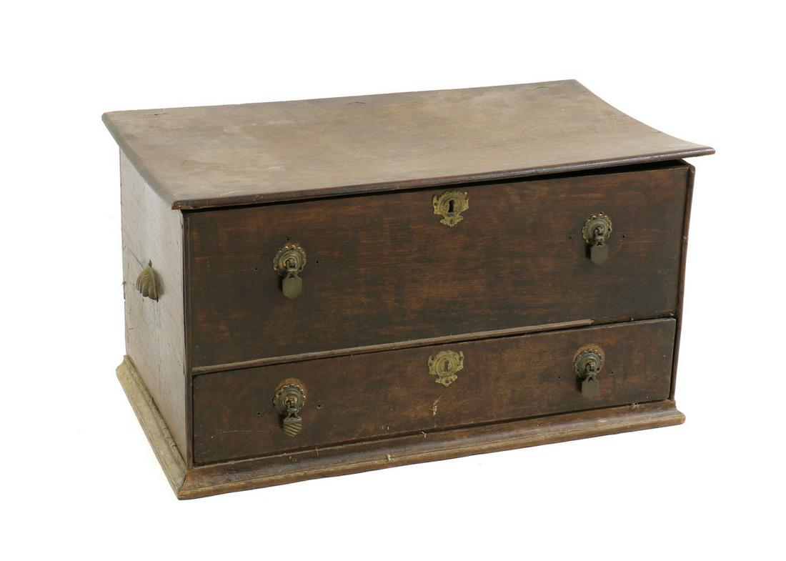 An oak mule chest: An oak mule chest An oak mule chest, early 18th century and later, the rectangular plank top above base drawer, of small dimensions 77cm wide 45cm deep 41cm high Condition Report: Replaced handles, ar
