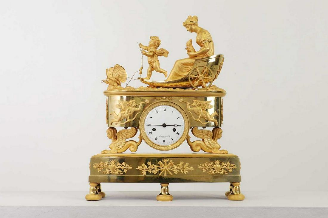 An Empire ormolu clock, (1 of 8)