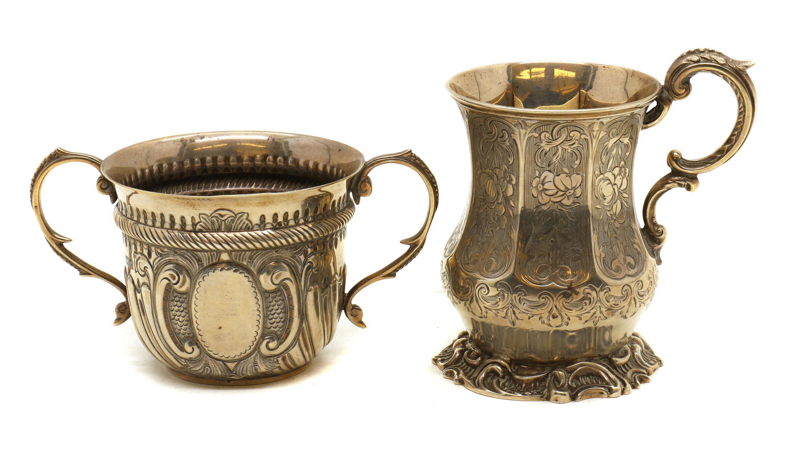 A Victorian silver Christening mug,: A Victorian silver Christening mug, A Victorian silver Christening mug, by George John Richards, London 1855, with embossed decoration, 11.5cm high together with a twin-handled cup, by Charles Stuart