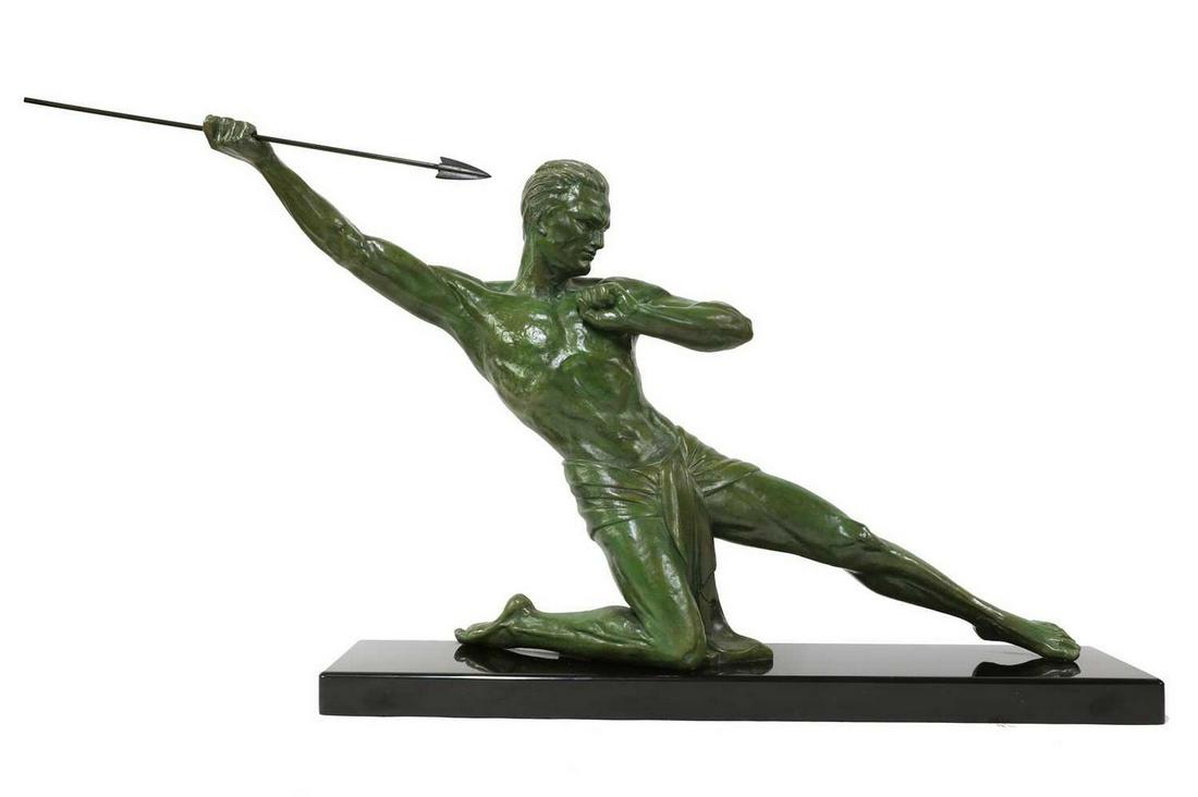 An Art Deco figure of a spear-thrower,: An Art Deco figure of a spear-thrower, An Art Deco figure of a spear-thrower, after Jean de Roncourt, raised on a marble plinth, inscribed 'J de Roncourt', with torn label to the underside 'St Fse Des