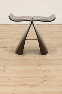 A Vitra 'Butterfly' stool,: A Vitra 'Butterfly' stool, A Vitra 'Butterfly' stool, designed in 1954 by Sori Yanagi, of plywood construction, veneered in Santos Palisander, joined by a brass support, 43cm wide 31cm deep 39cm high