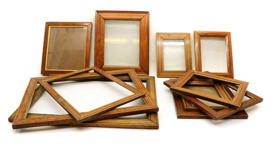 A group of nine picture frames: A group of nine picture frames A group of nine picture frames, with ebony or ebonised stringing, largest 51.5 x 39cm smallest 25 x 19cm, together with a further similar pair, 27.5 x 24cm (11) The Esta