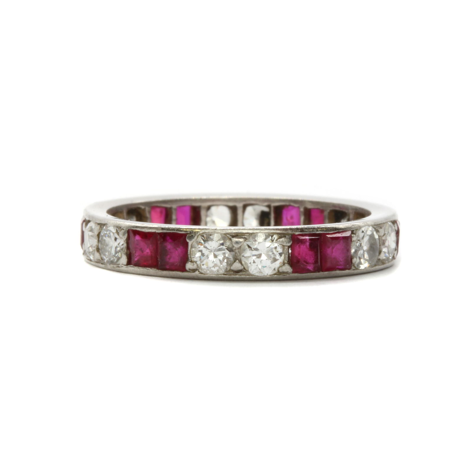 A synthetic ruby and diamond full eternity ring, (1 of 1)