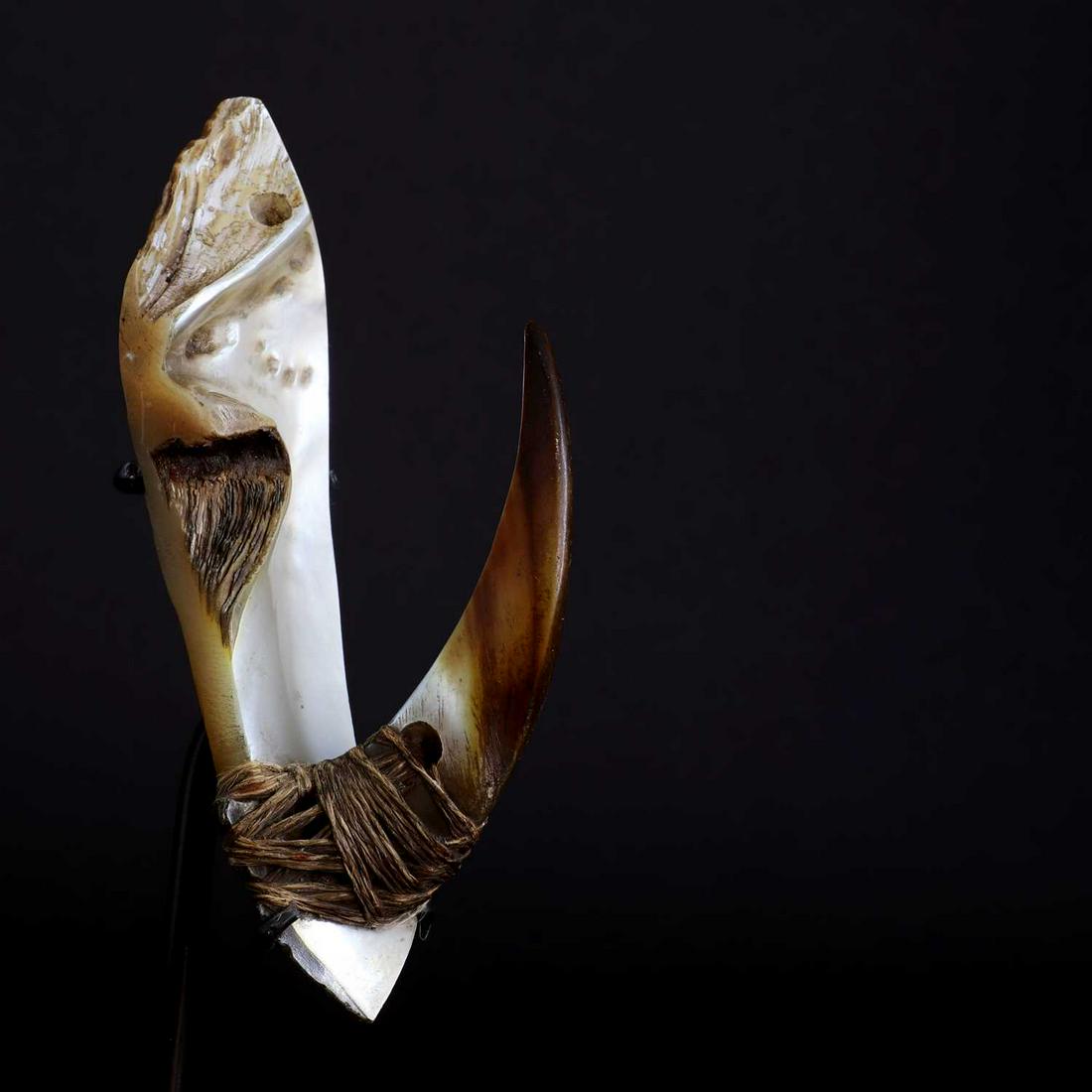 An Oceanic mother-of-pearl bonito fish hook, (1 of 7)