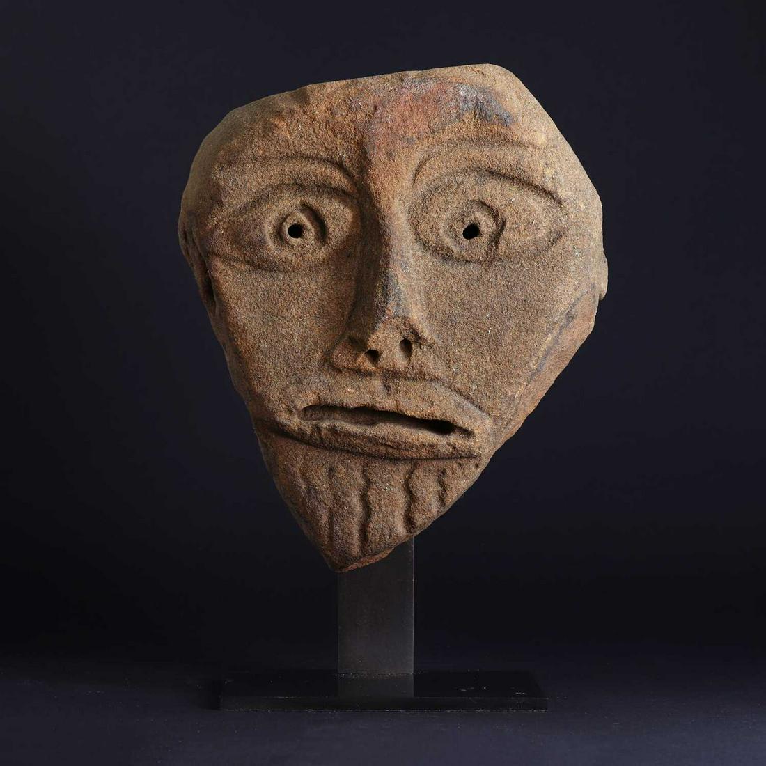 A Celtic sandstone Pagan head, (1 of 6)