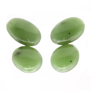 A pair of French 18ct gold nephrite and jade clip on earrings, designed by Suzanne Belperron,: A pair of French 18ct gold nephrite and jade clip on earrings, designed by Suzanne Belperron, A pair of French 18ct gold nephrite and jade clip on earrings, designed by Suzanne Belperron, with two sli