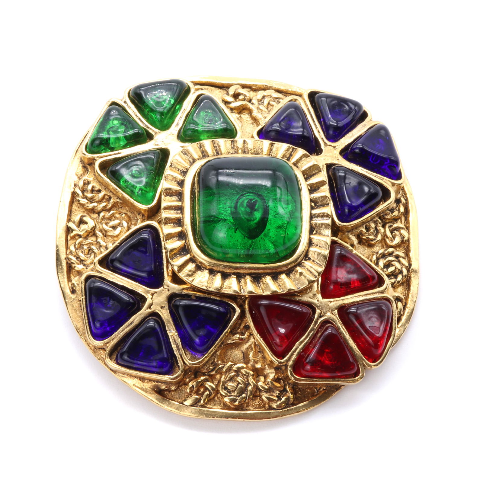 A Chanel gold plated brooch, (1 of 2)