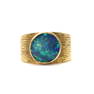 A gold single stone black opal ring,