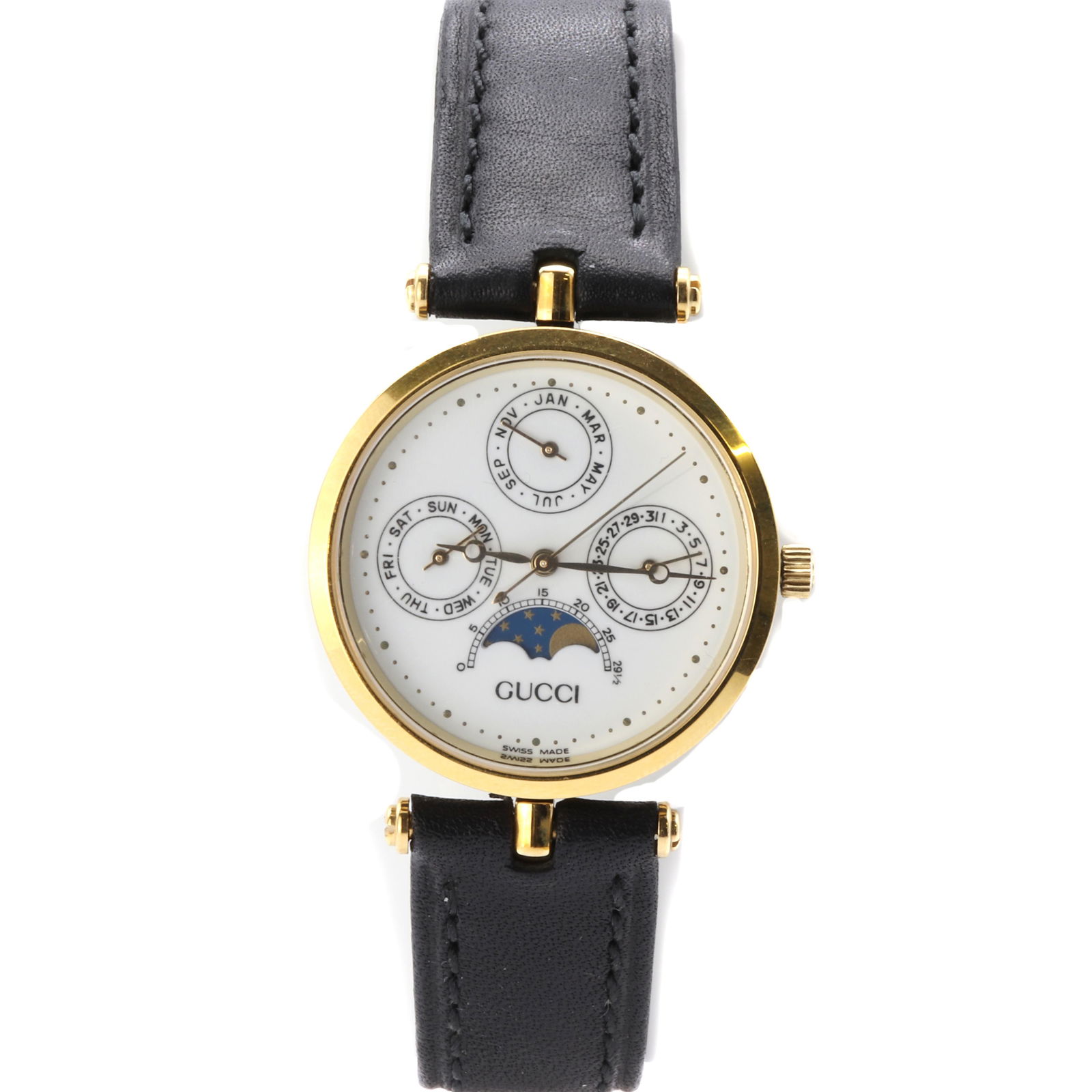 A gold plated Gucci quartz strap watch,: A gold plated Gucci quartz strap watch, A gold plated Gucci quartz strap watch, 30mm diameter with a white dial day, date and month subdials and a day/night indicator, with a banded black enamel and g