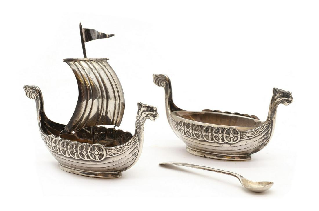 A pair of Norwegian silver salts,: A pair of Norwegian silver salts, A pair of Norwegian silver salts, by Marius Hammer, marked 925, modelled as Viking longships, one example with sails, the other with a clear glass liner, both with an