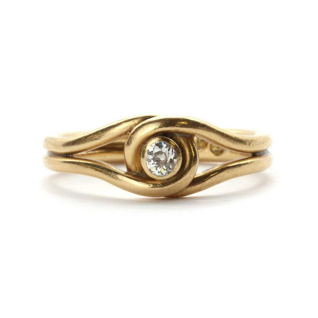 A gold single stone diamond ring, (1 of 3)