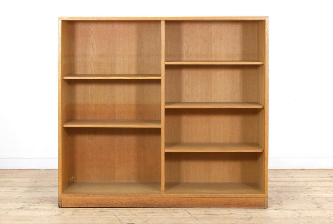 A light oak open bookcase,: A light oak open bookcase, A light oak open bookcase, designed by Børge Mogensen for Karl Andersson & Söner, with two divisions with two and three adjustable shelves, branded, 134.5cm wide 3