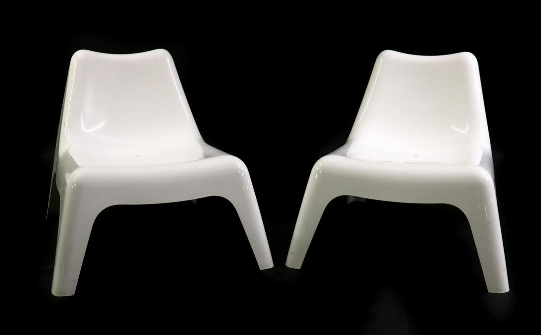 A pair of 'Vågö' moulded plastic lounge chair,: A pair of 'Vågö' moulded plastic lounge chair, A pair of 'Vågö' moulded plastic lounge chair, designed in 2000 by Thomas Sandell for IKEA, 74cm wide 92cm deep 71cm high, seat 36cm
