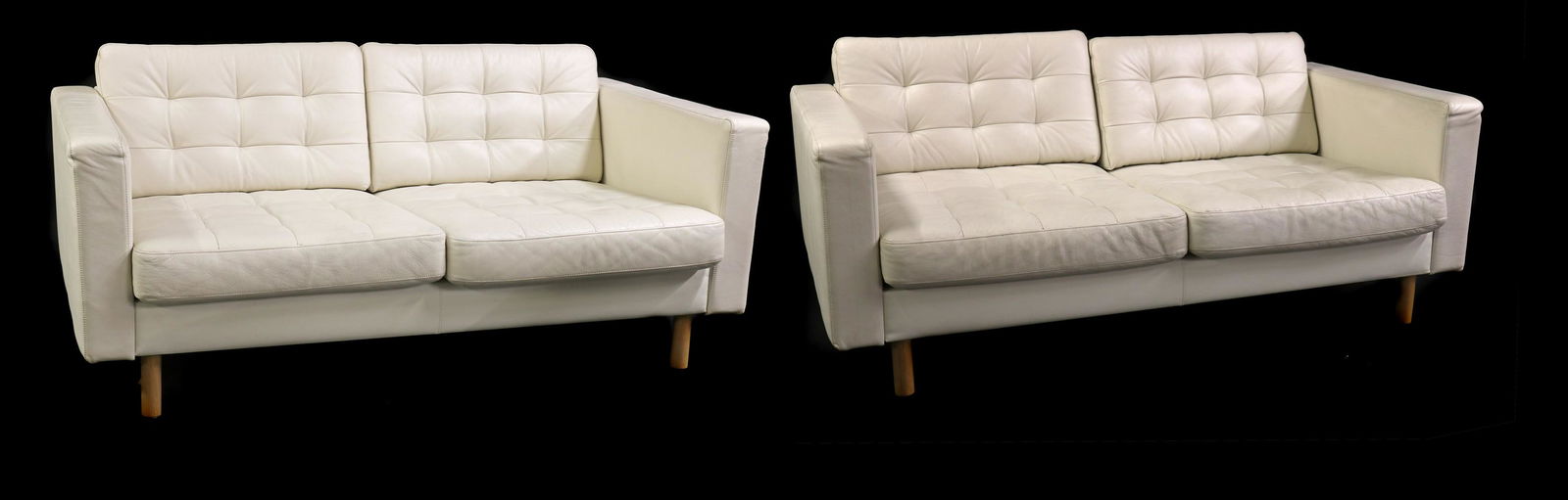 A pair of Ikea 'Landskrona' two-seater settees,: A pair of Ikea 'Landskrona' two-seater settees, A pair of Ikea 'Landskrona' two-seater settees, each with white button back 162cm wide 88cm deep 63cm high, seat 40cm (2) Buying these sofas at auction