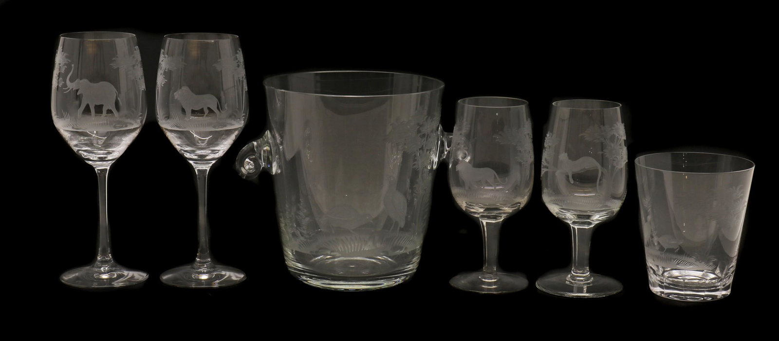 A set of Queen Lace crystal glass,: A set of Queen Lace crystal glass, A set of Queen Lace crystal glass, comprising an ice bucket, 18.5cm high, and a tumbler, 12cm high, engraved with game birds, two wine glasses, 22.5cm high, engraved