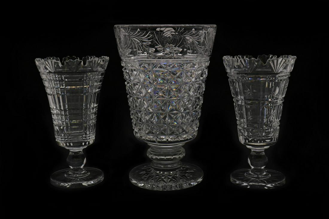A Stuart Crystal glass 'Mansfield' pattern vase,: A Stuart Crystal glass 'Mansfield' pattern vase, A Stuart Crystal glass 'Mansfield' pattern vase, 20th century, with cut decoration throughout, raised on a short stem and star cut foot, acid marked, 3
