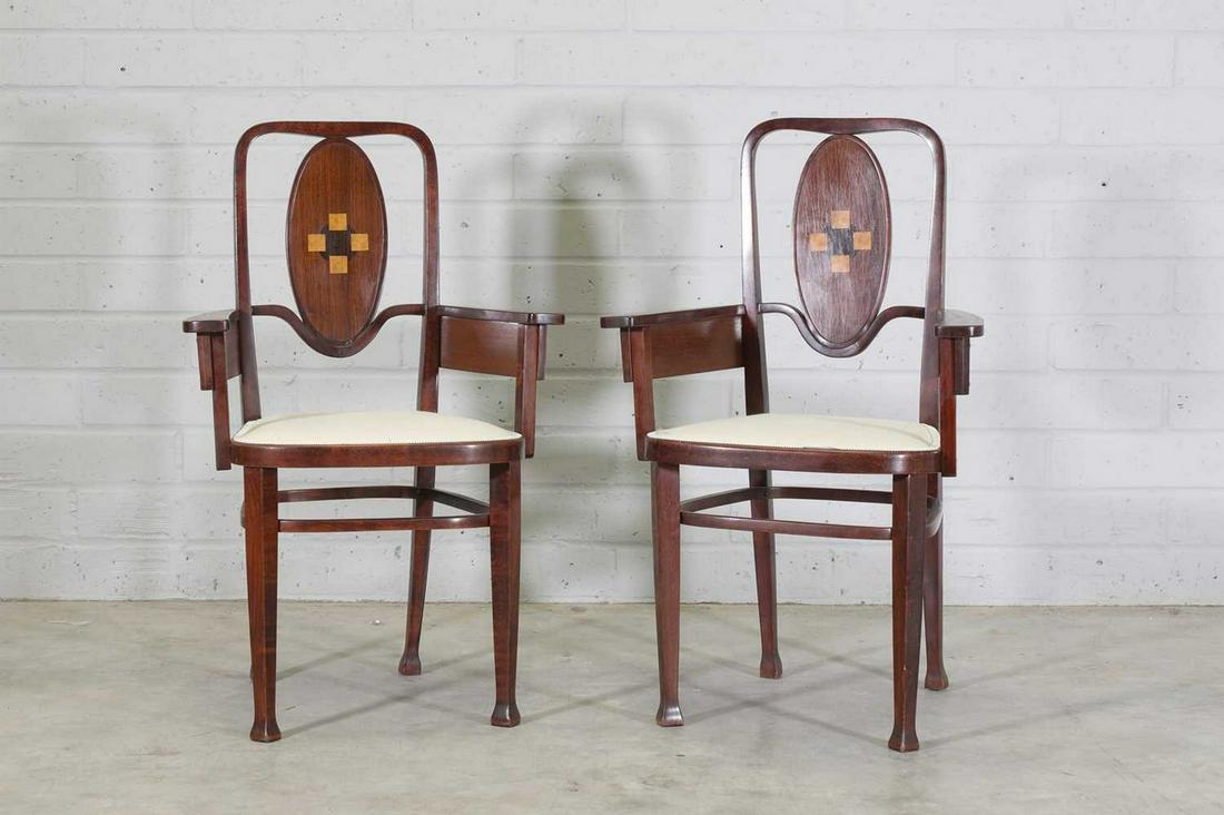 A pair of Austrian 'Model No. 414' Secessionist bentwood armchairs,: A pair of Austrian 'Model No. 414' Secessionist bentwood armchairs, A pair of Austrian 'Model No. 414' Secessionist bentwood armchairs, c.1908, designed by Marcel Kammerer for Thonet, each oval back a
