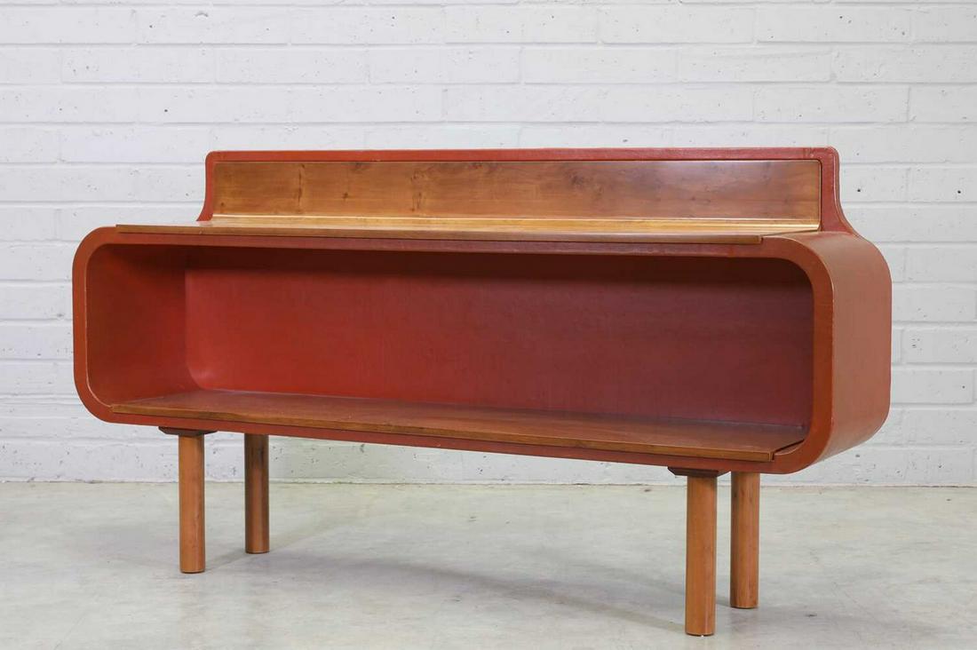 A yew wood wall-mounted open side cabinet,: A yew wood wall-mounted open side cabinet, A yew wood wall-mounted open side cabinet, designed and made by John Makepeace, mounted with tan leather, labelled 'Designed and Made by John Makepeace M.S.I