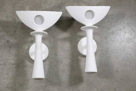 A pair of 'Mati' wall lights,: A pair of 'Mati' wall lights, A pair of 'Mati' wall lights, designed by Alexandre Logé, each of moulded plaster with a plastic-mounted aperture, labelled 'AL' on a brass plate, 30cm wide 18cm dee