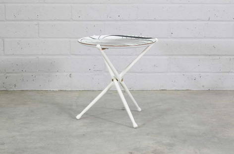 A Swedish tray table,: A Swedish tray table, A Swedish tray table, designed by Nils Trautner and Astrid Sampe for Ary, Sweden, with a lithographed tray, raised on a white folding tripod stand, 44cm diameter 47cm high Condit