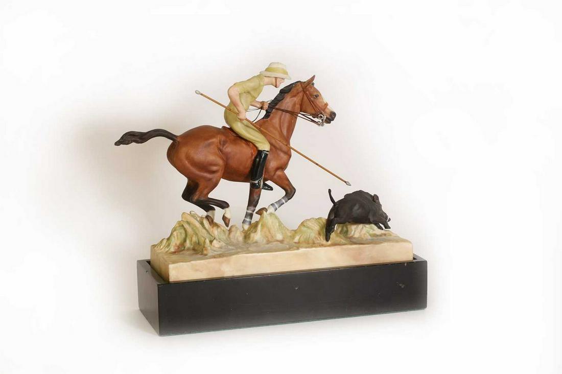 A Royal Worcester porcelain 'Hog-Hunting' figure: A Royal Worcester porcelain 'Hog-Hunting' figure A Royal Worcester porcelain 'Hog-Hunting' figure modelled by Doris Lindner, with printed mark and 'no. 3164', raised on an ebonised base 26cm wide 9cm