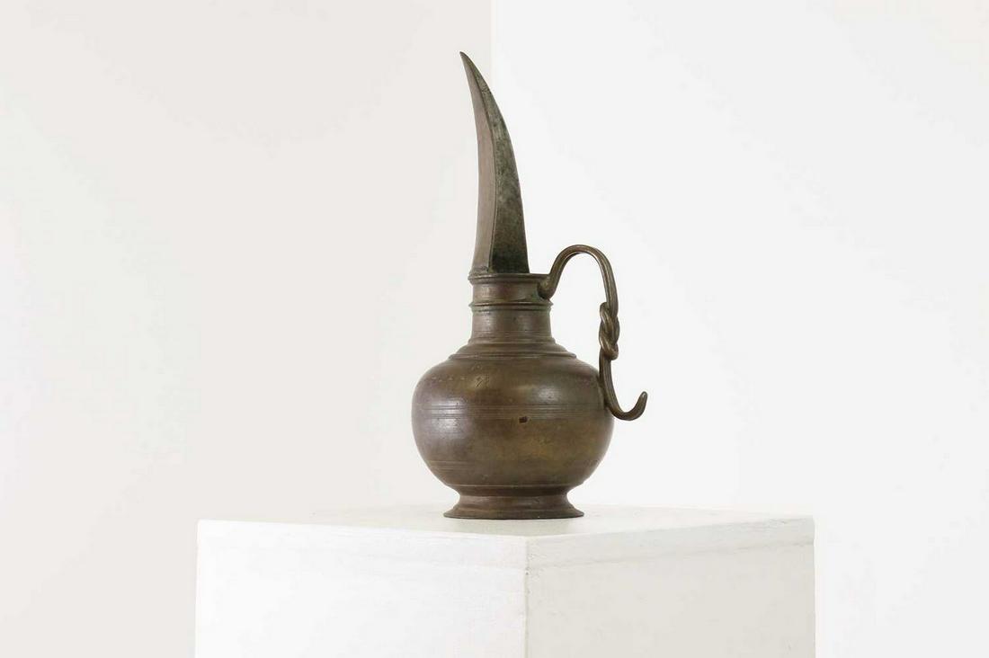 A brass temple oil ewer. (1 of 7)