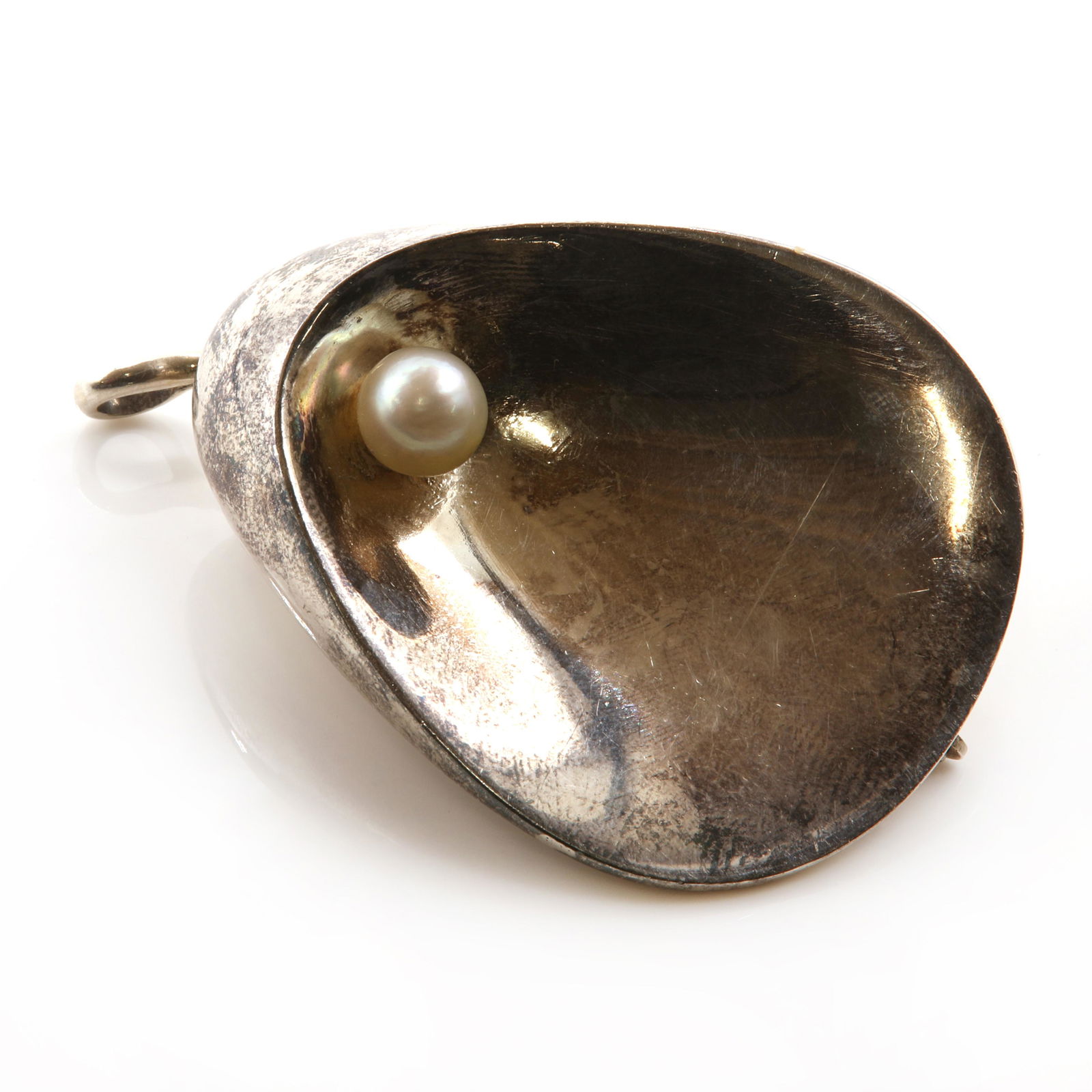 A sterling silver cultured pearl shell brooch/pendant, by Georg Jensen, (1 of 2)
