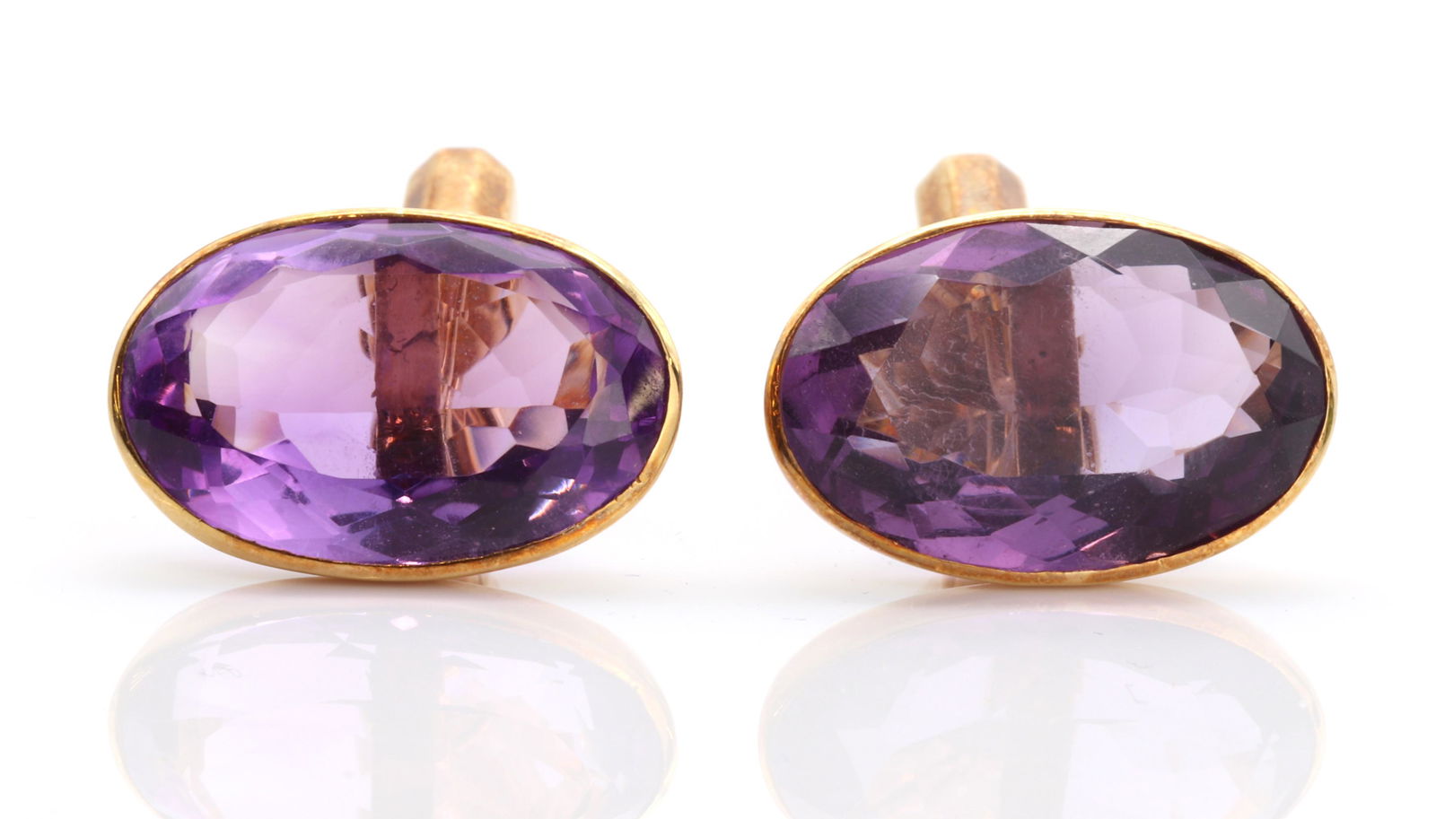 A pair of 18ct gold single stone amethyst cufflinks, (1 of 2)
