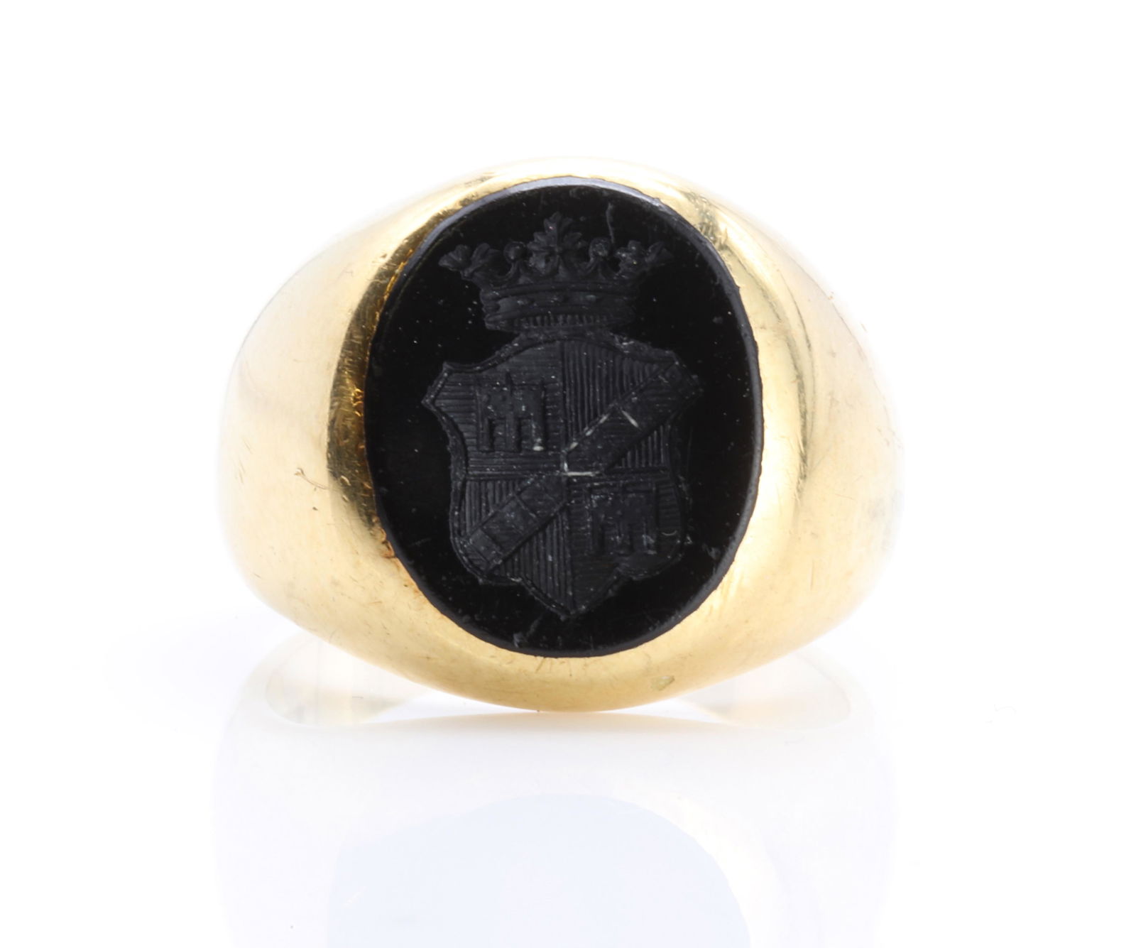 A gentlemen's gold and onyx set oval signet ring, (1 of 3)