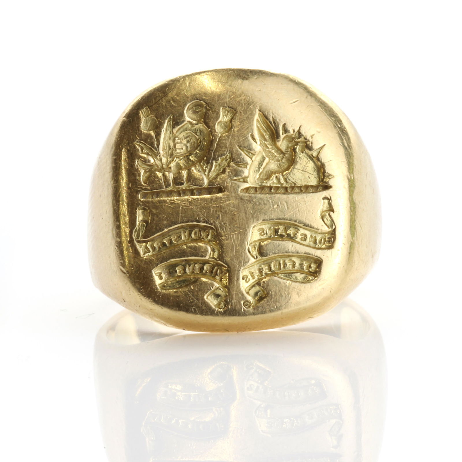 A gentlemen's cushion shaped signet ring, by S J Rose, (1 of 3)