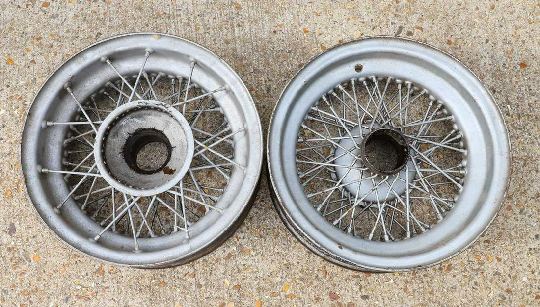 A pair of Invicta spoked steel wheel rims,: A pair of Invicta spoked steel wheel rims, A pair of Invicta spoked steel wheel rims, finished in silver, 18in diameter (2)