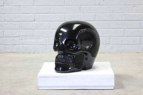 Antonio Cagianelli (Italian, b.1964): Antonio Cagianelli (Italian, b.1964) ▴ Antonio Cagianelli (Italian, b.1964) Transvital, 2008 a black-glazed ceramic stool modelled as a skull, signed to the hollow inside and numbered '6/20' 50c